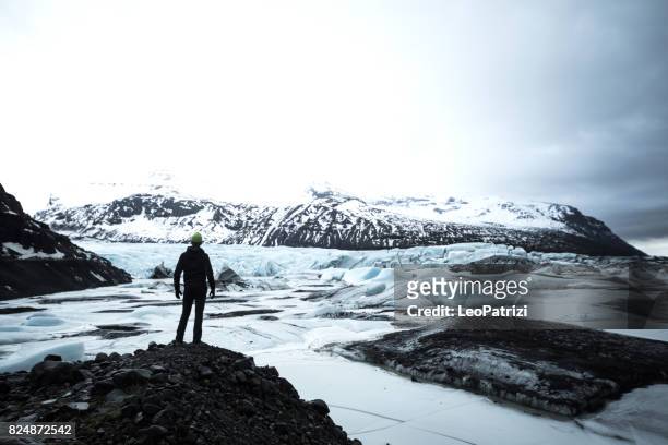 solo traveler exploring iceland - arctic explorer stock pictures, royalty-free photos & images