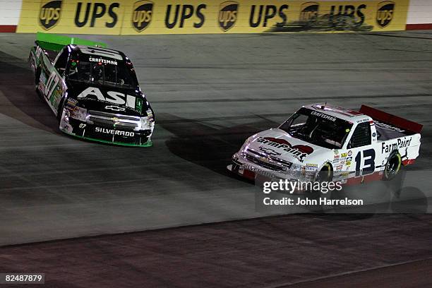 Sean Murphy, driver of the ASI Limited Chevrolet, spins going into turn 3 during the NASCAR Craftsman Truck Series O'Reilly 200 at Bristol Motor...