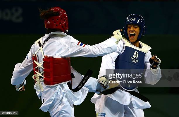 Diana Lopez of the United States fights Chonnapas Premwaew of Thailand in the Women -57kg Preliminary Round of 16 held at the Beijing Science and...