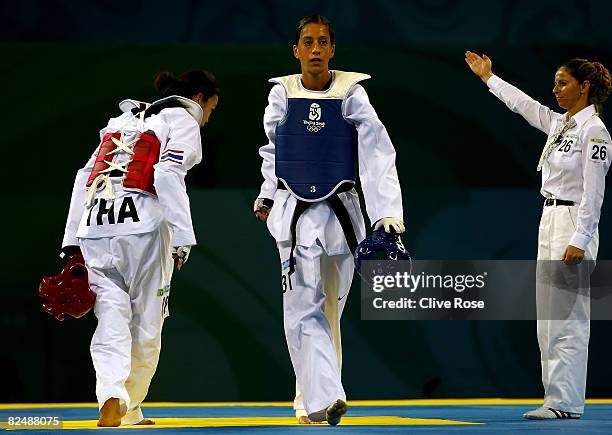 Diana Lopez of the United States defeats Chonnapas Premwaew of Thailand in the Women -57kg Preliminary Round of 16 held at the Beijing Science and...