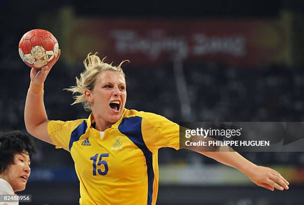 Sweden's Johanna Ahlm shoots at China's goal during a women's placement 5-8 handball match of the 2008 Beijing Olympic Games on August 21, 2008 in...