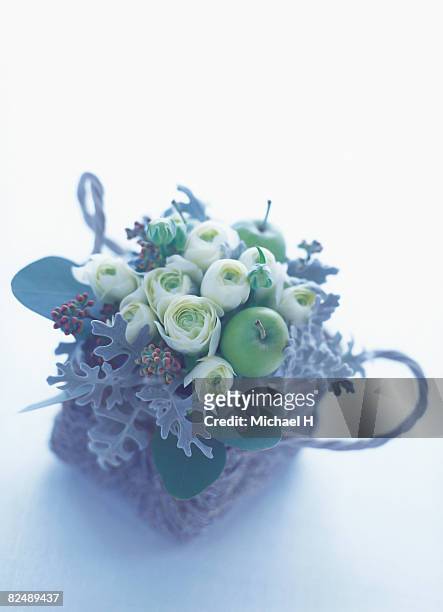 flower arrangement in basket - cineraria maritima stock pictures, royalty-free photos & images