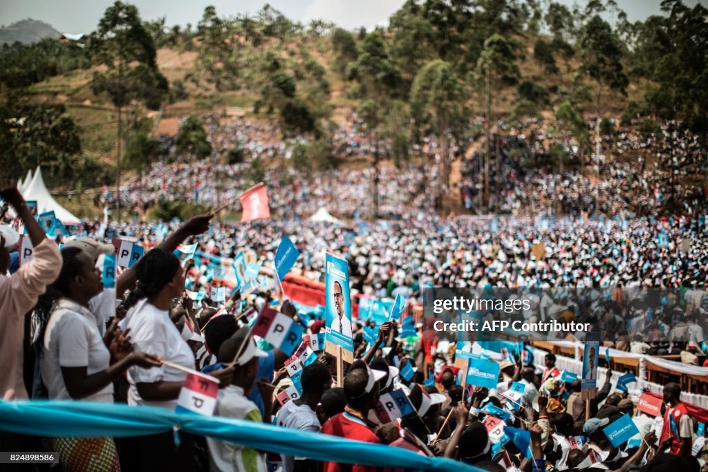 New Information In Rwanda Supporters of the incumbent Rwandan President Paul Kagame gather for ...