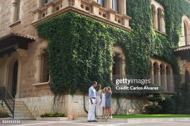 King Felipe VI of Spain, Queen Letizia of Spain, Princess Leonor of Spain and Princess Sofia of Spain pose for the photographers during the summer...