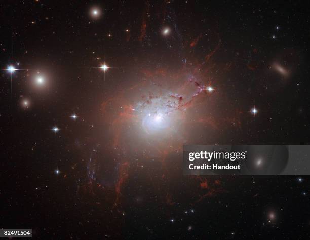 This handout image of the giant, active galaxy NGC 1275, obtained August 21, 2008 was taken using the NASA/ESA Hubble Space Telescope?s Advanced...