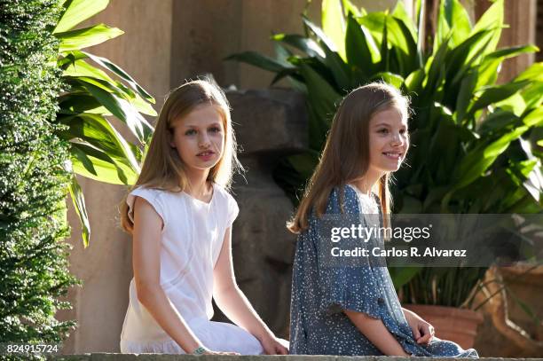 Princess Leonor of Spain and Princess Sofia of Spain pose for the photographers during the summer photocall at the Marivent Palace on July 31, 2017...