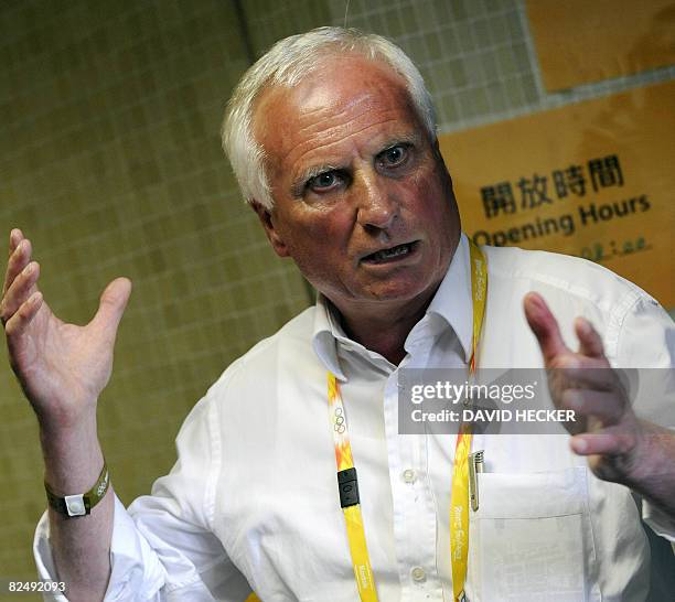 Hanfried Haring, general secretary of the German Equestrian Federation, gestures as he speaks to the press in Hong Kong on August 21, 2008 just hours...