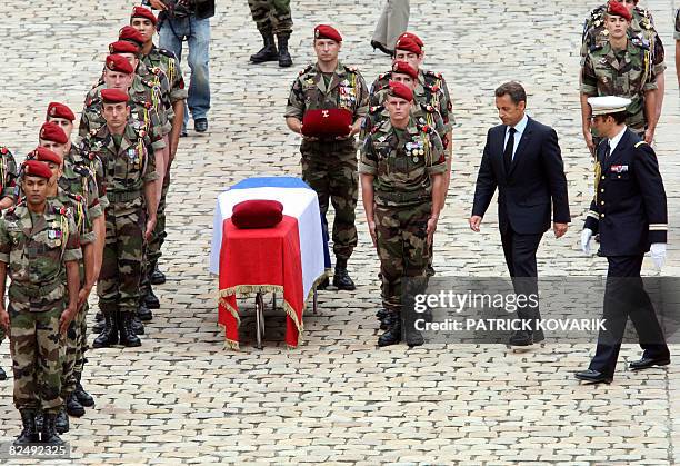 French President Nicolas Sarkozy conducts a national ceremony at the Invalides to pay tribute to the 10 French NATO troops in Afghanistan, killed...