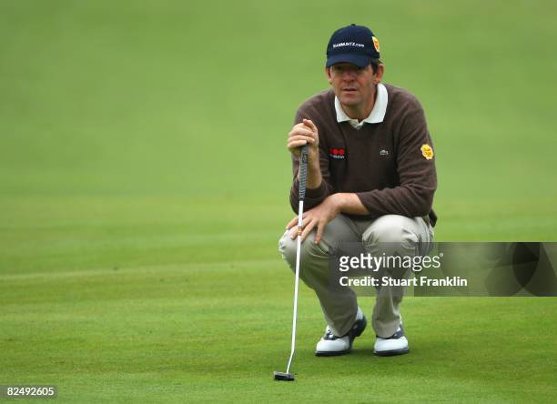 Rolf Muntz of The Netherlands lines up his putt on the 16th hole during first round of The KLM Open at Kennemer Golf & Country Club on August 21,...