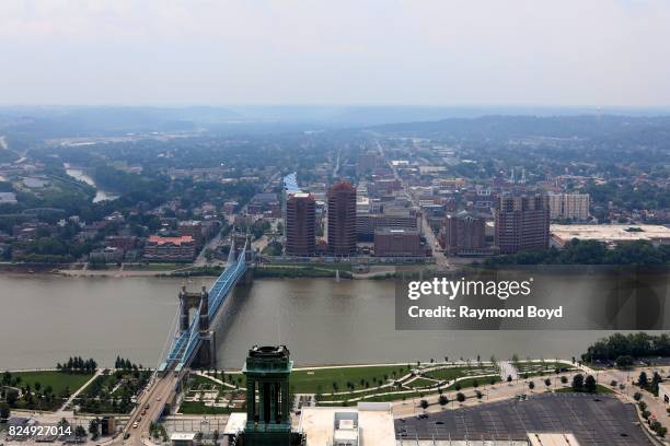 John A. Roebling Bridge and Covington, Kentucky skyline, as photographed from the Carew Tower observatory deck in Cincinnati, Ohio on July 22, 2017.