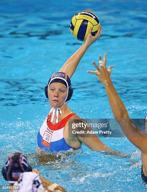 Yasemin Smit of the Netherlands looks to move the ball during the gold medal water polo match against the United States held at the Yingdong...