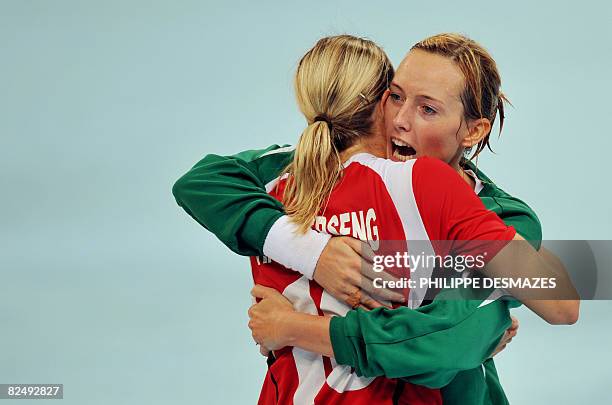 Norway's Gro Hammerseng and goalkeeper Katrine Lunde Haraldsen celebrate after defeating South Korea in a women's handball semifinal of the 2008...