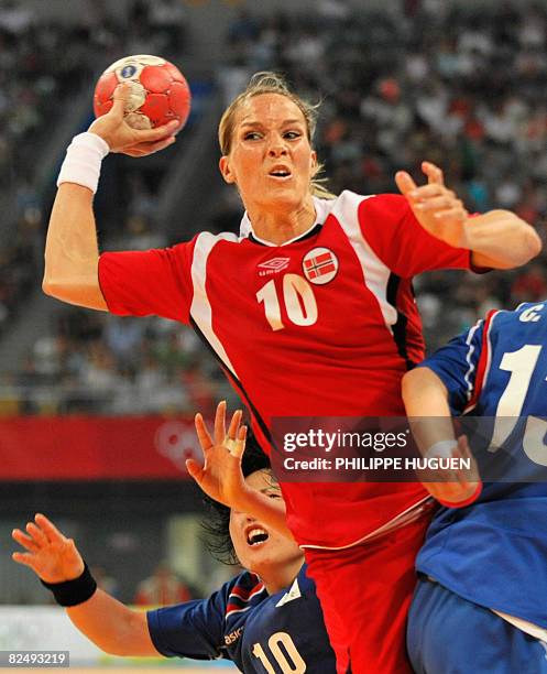 Norway's Gro Hammerseng aims at South Korea's goal during a women's handball semifinal of the 2008 Beijing Olympic Games on August 21, 2008 in...