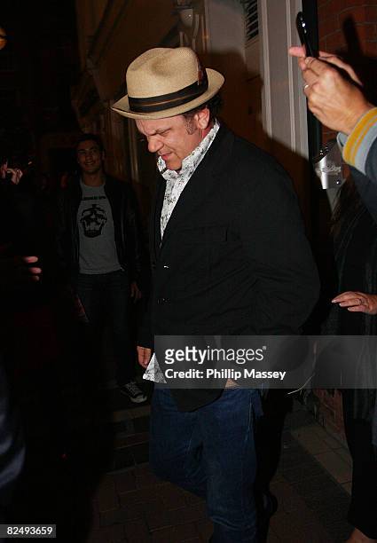 John C. Reilly leaves Neary's pub on August 20, 2008 in Dublin, Ireland.
