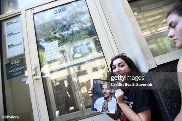 Fans greet Louis Tomlinson at Music Choice on July 31, 2017 in New York City.