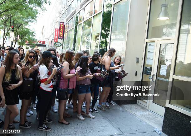 Fans greet Louis Tomlinson at Music Choice on July 31, 2017 in New York City.