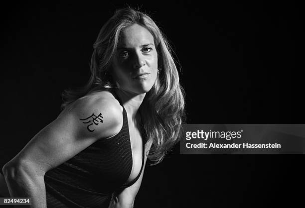 Olympic cyclist Hanka Kupfernagel is seen with her Chinese Zodiac sign Tiger during a photo session on May 6, 2008 in Freiburg, Germany.