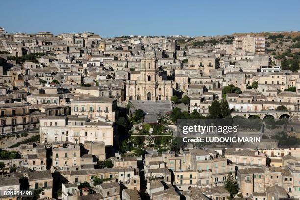 Picture taken on July 31, 2017 shows the Cathedral of San Giorgio , in Modica, Sicily. - Modica is part of the Italy's UNESCO Heritage Sites.