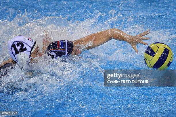 Kami Craig of the US vies with Yasemin Smit of The Netherlands during the Women's Water Polo Finals match at the 2008 Beijing Olympic Games in...