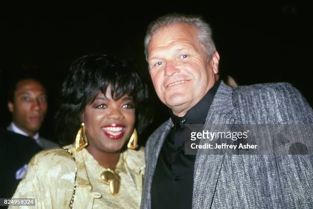 Actress and TV Personality Oprah Winfrey with Actor Brian Dennehy at Tyson vs Spinks Convention Hall in Atlantic City, New Jersey June 27 1988.