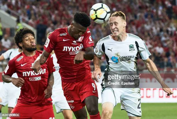 Ze Luis FC Spartak Moscow vies for the ball with Aleksei Gritsayenko of FC Krasnodar during the Russian Premier League match between FC Spartak...