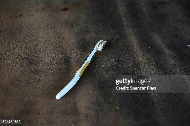 Toothbrush is left behind in what was a heroin shooting gallery in the Kensington section of Philadelphia which has become a hub for heroin use on...