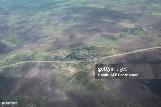 An aerial view of a small town not far from Rann in Borno State, northeastern Nigeria on July 29, 2017. On January 17, 2017 the Rann...