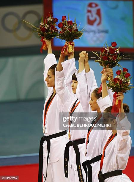 Silver medalist Azize Tanrikulu of Turkey, gold medalist Lim Sujeong of South Korea, bronze medalists Diana Lopez of the US and Martina Zubcic of...