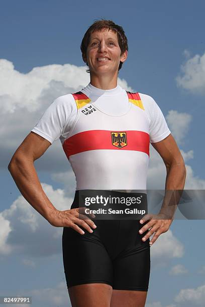 German olympic rower Kathrin Boron poses for a picture with a tattoo of her Chinese zodiac, the Rooster, on June 26, 2008 near Potsdam, Germany.