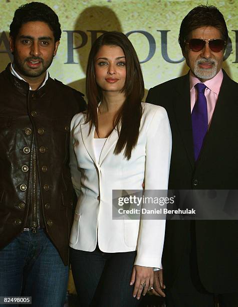 Bollywood stars Abhishek Bachchan, wife Aishwarya Rai Bachchan and Amitabh Bachchan pose for photographs during the photocall for the Unforgettable...