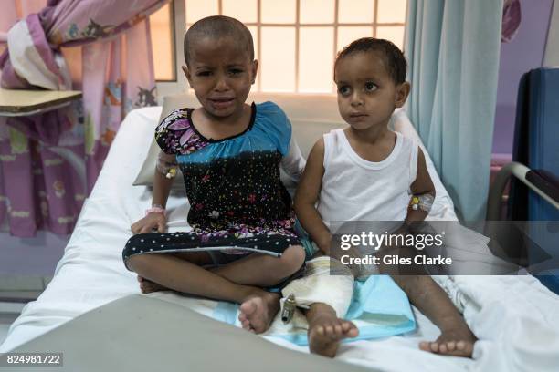 Three-year-old Ahmed and his 6-year-old sister Khaoula survived an attack by an airstrike on their house in Al Mutun on 14 April 2017. Their parents,...