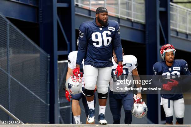 New England Patriots defensive lineman Darius Kilgo walks to the field during New England Patriots training camp on July 29 at the Patriots Practice...