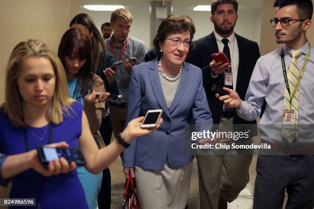 Sen. Susan Collins talks with reporters as she heads to the U.S. Capitol for a vote July 31, 2017 in Washington, DC. Senate GOP leadership was unable...