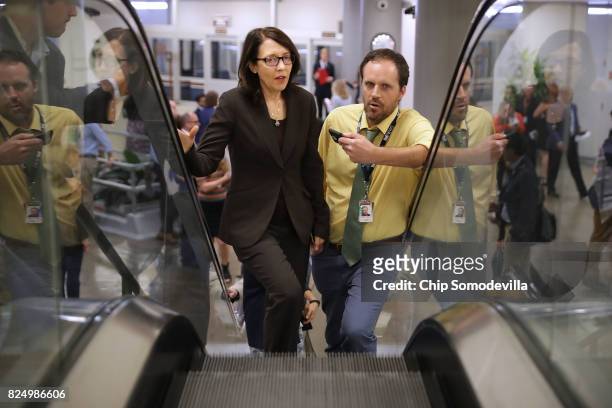 Sen. Maria Cantwell talks with reporters as she heads to the U.S. Capitol for a vote July 31, 2017 in Washington, DC. Senate GOP leadership was...