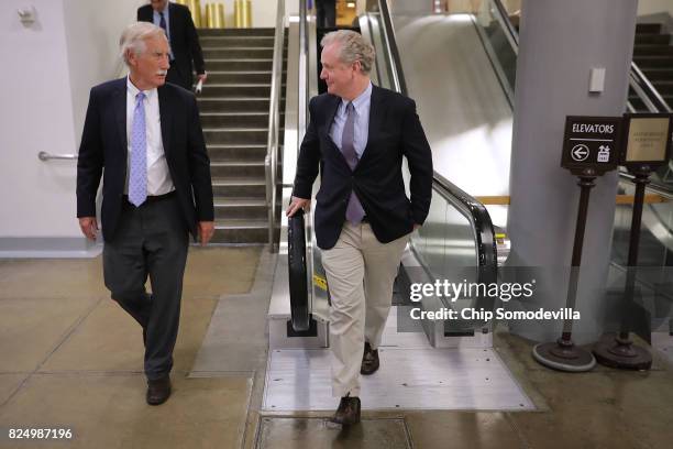 Sen. Angus King and Sen. Chris Van Hollen walk and talk following a vote at the U.S. Capitol July 31, 2017 in Washington, DC. Senate GOP leadership...