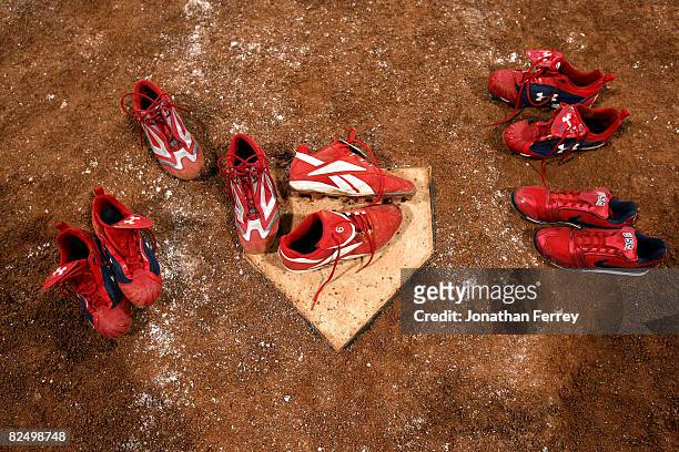 The shoes worn by players from the United States remain at home plate after the five players left them there following USA's 3-1 loss to Japan during...
