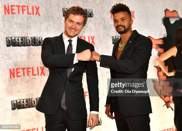 Finn Jones and Eka Darville attend the "Marvel's The Defenders" New York Premiere at Tribeca Performing Arts Center on July 31, 2017 in New York City.