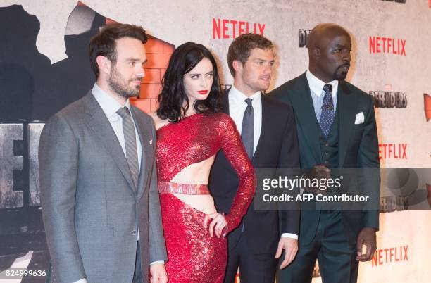 Charlie Cox, Krysten Ritter, Finn Jones and Mike Colter arrive for the Netflix premiere of Marvel's "The Defenders" on July 31, 2017 in New York. /...