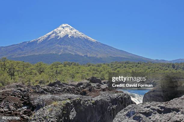 the petrohue falls and osorno volcano near llanquihue in the chilean lake district. - llanquihue lake stock pictures, royalty-free photos & images