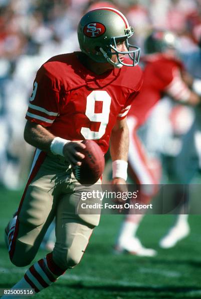 Jeff Kemo Rams Jeff Kemp of the San Francisco 49ers looks to pass against the ...
