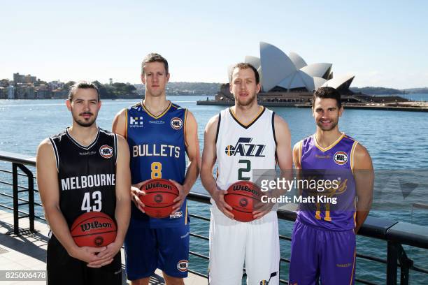 Chris Goulding of Melbourne United, Daniel Kickert of the Bisbane Bullets, Joe Ingles of the Utah Jazz and Kevin Lisch of the Sydney Kings pose...