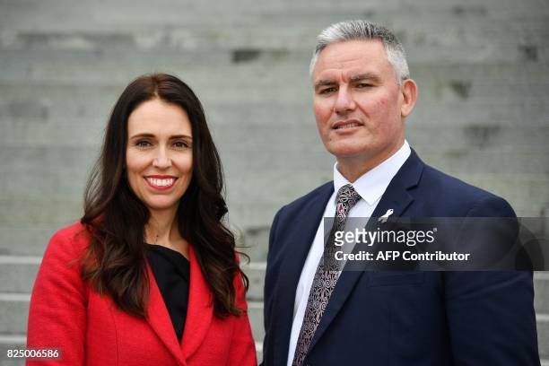 New leader of the Labour Party Jacinda Ardern with her deputy Kelvin Davis pose on the steps at Parliament in Wellington on August 1, 2017. Ardern...