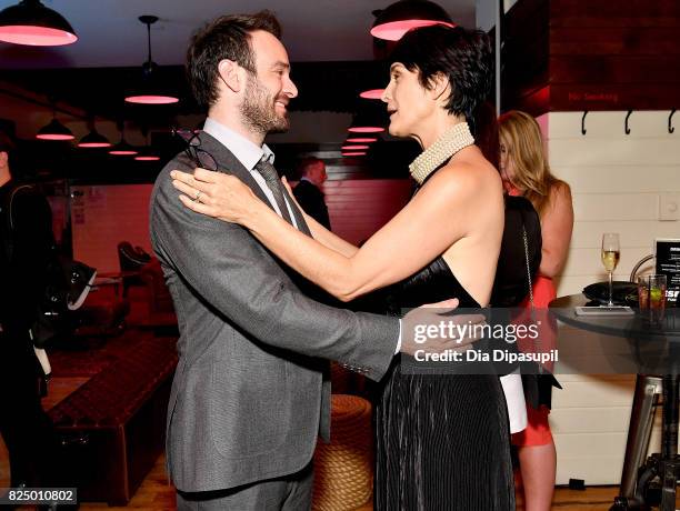 Charlie Cox and Carrie-Anne Moss attend the "Marvel's The Defenders" New York Premiere - After Party at The Standard Biergarten on July 31, 2017 in...