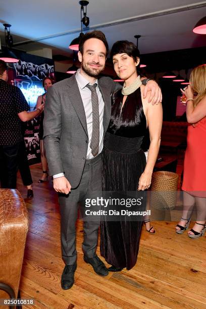 Charlie Cox and Carrie-Anne Moss attend the "Marvel's The Defenders" New York Premiere - After Party at The Standard Biergarten on July 31, 2017 in...