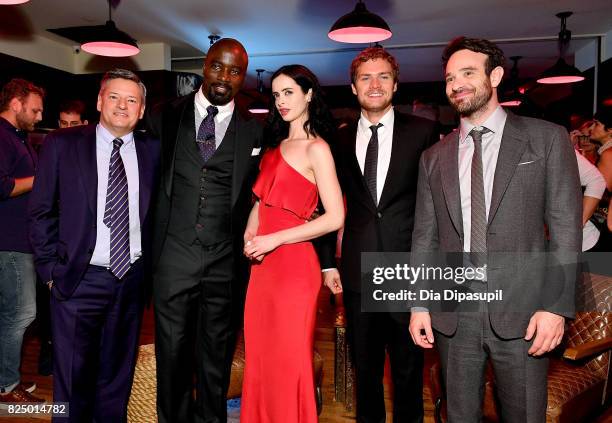 Chief Content Officer at Netflix, Ted Sarandos, Mike Colter, Krysten Ritter, Finn Jones and Charlie Cox attend the "Marvel's The Defenders" New York...