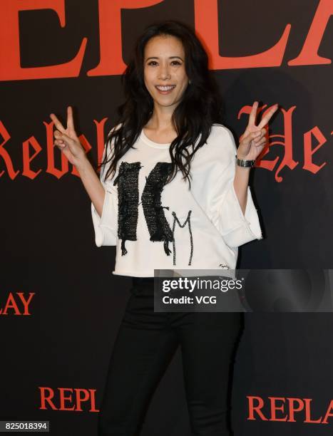 Singer Karen Mok attends Replay fashion show on July 31, 2017 in Shanghai, China.