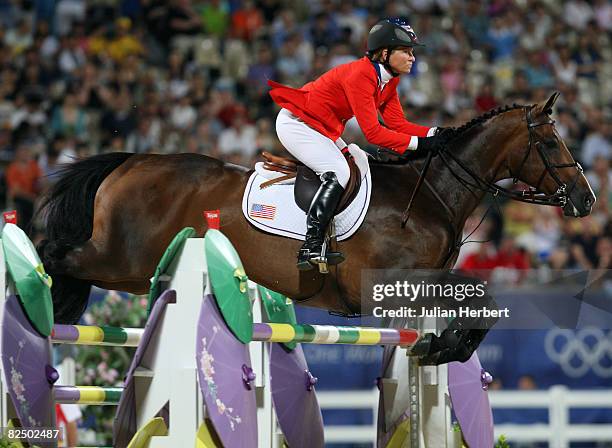 Beezie Madden of the United States and Authentic jump a fence during the Individual Jumping Final - Round B held at the Hong Kong Olympic Equestrian...