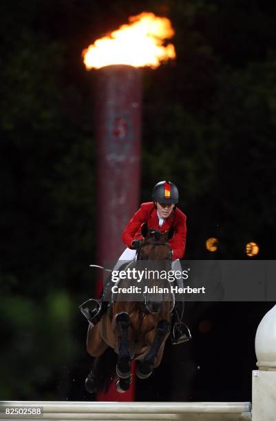 Meredith Michaels-Beerbaum of Germany and Shutterfly jump a fence during the Jump Off for the bronze medal during the Individual Jumping Final held...