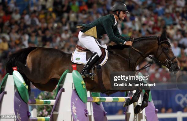Rodrigo Pessoa of Brazil and Rufus jump a fence during the Individual Jumping Final - Round B held at the Hong Kong Olympic Equestrian Venue in Sha...