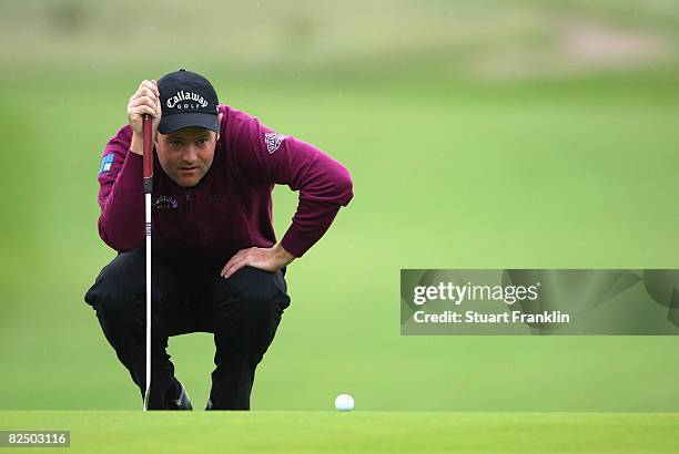 Alastair Forsyth of Scotland lines up his putt on the 13th hole during first round of The KLM Open at Kennemer Golf & Country Club on August 21, 2008...